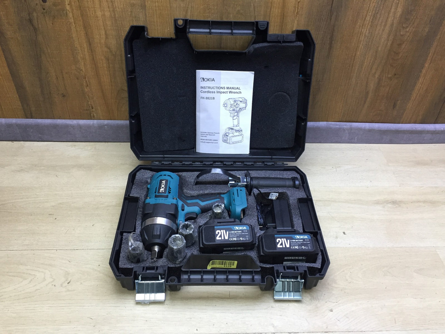Aokia FH-8821B cordless impact wrench, including 2x 21V 4.0Ah batteries and charger, I33247