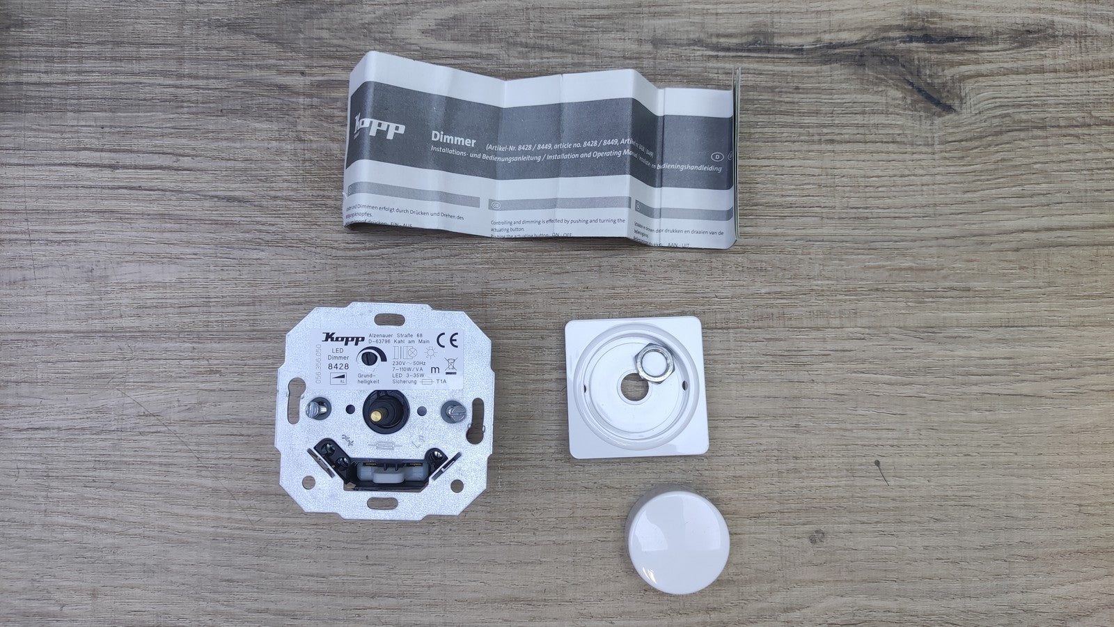 Kopp 8428 LED Dimmer Sockel mit Druck-Wechselschalter, I39287